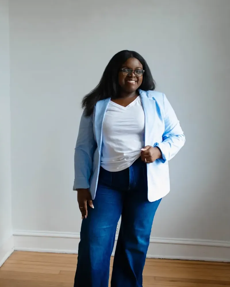 Lavonya Payne, Petersburg VA Realtor with eXp Realty, smiling in a light blue blazer